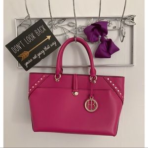 Henri Bendel fuscia multi-styled purse